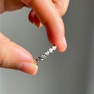 10k white gold 3mm bezel set ring with moissanite stones